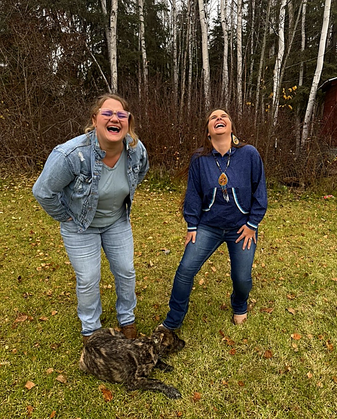 Magen Spencer and Brianna Ketzler laughing together outdoors in Alaska